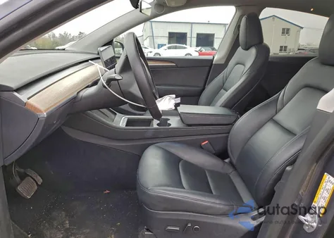 2023 Tesla Model Y from USA, damaged, VIN 7SAYGDED4PF933948